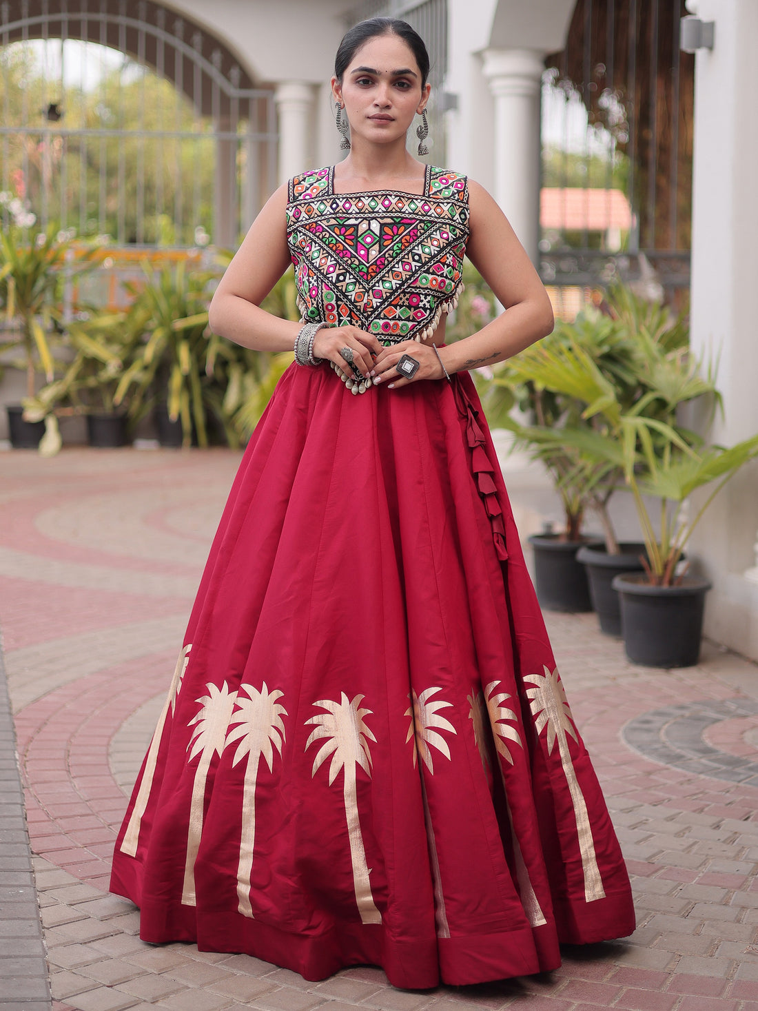 Impressive Maroon Kutchi Work Silk Navratri Wear Lehenga Choli