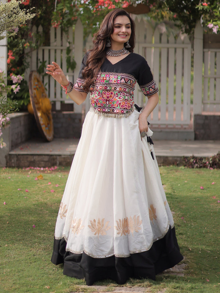 Dazzling White Kutchi Work Silk Navratri Wear Lehenga Choli