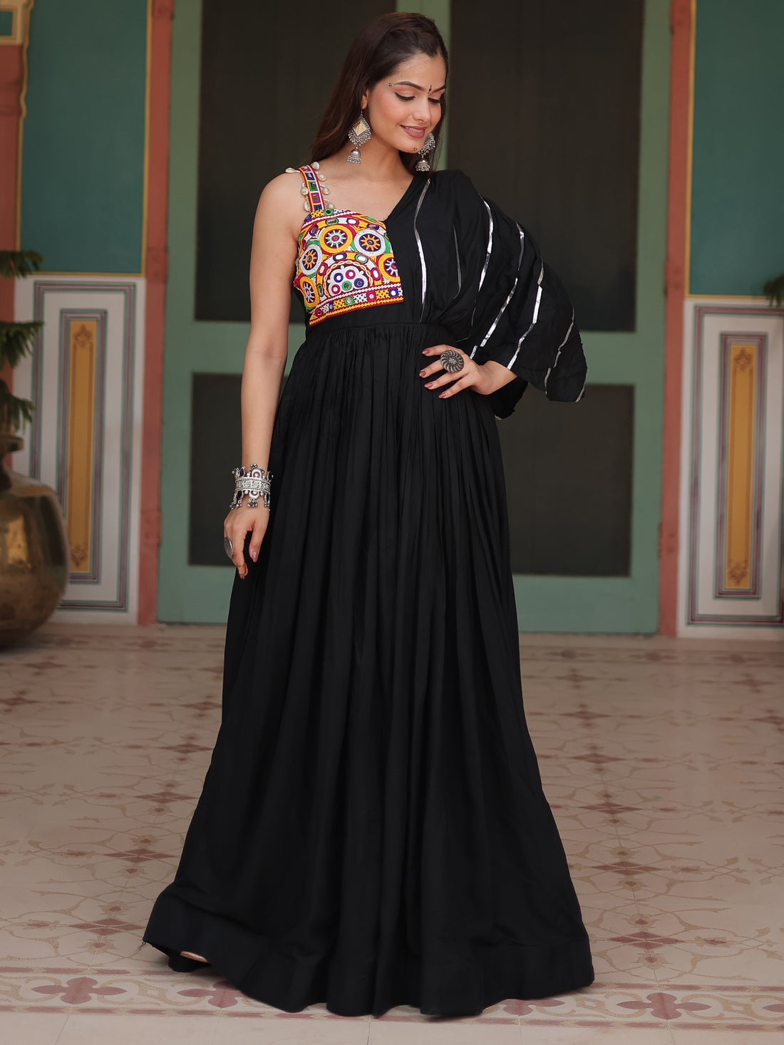 Fascinating Black Mirror Work Rayon Navratri Wear Gown
