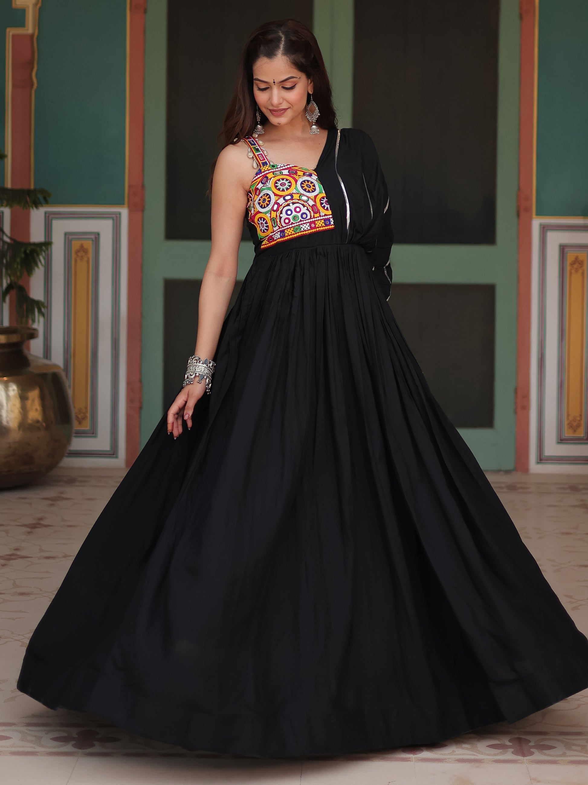 Fascinating Black Mirror Work Rayon Navratri Wear Gown