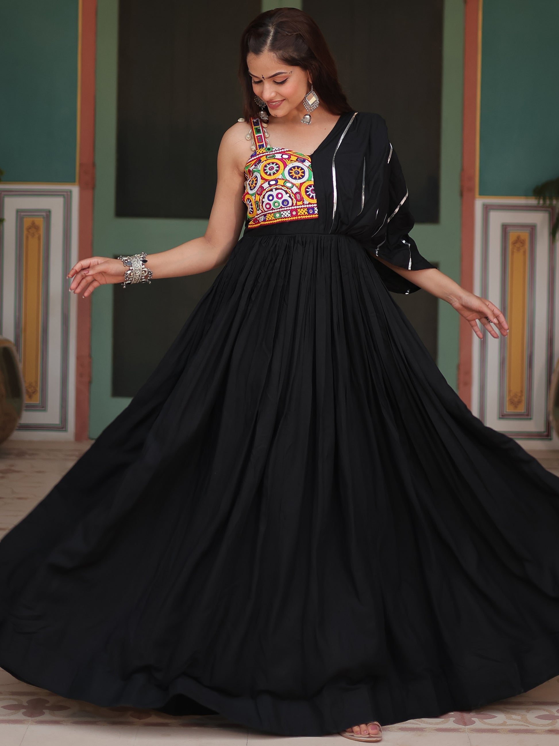 Fascinating Black Mirror Work Rayon Navratri Wear Gown