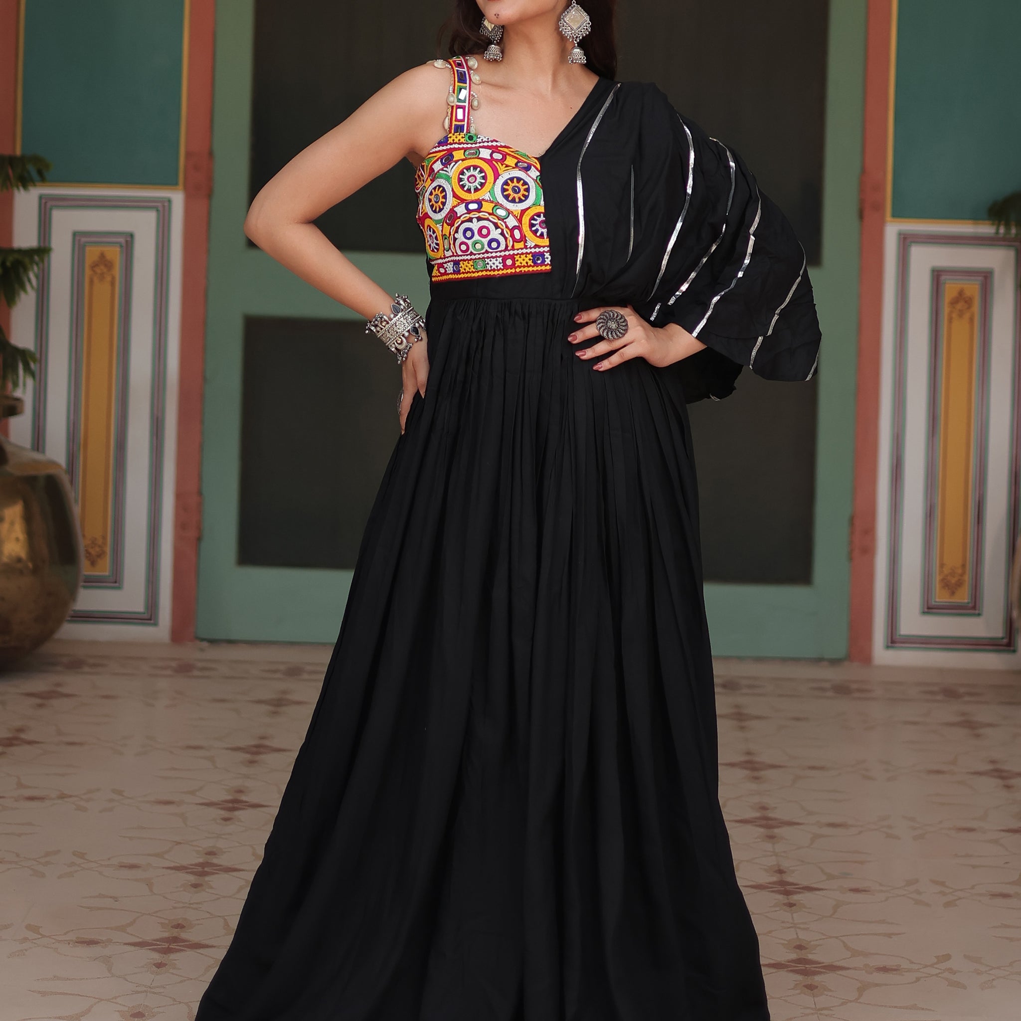 Fascinating Black Mirror Work Rayon Navratri Wear Gown