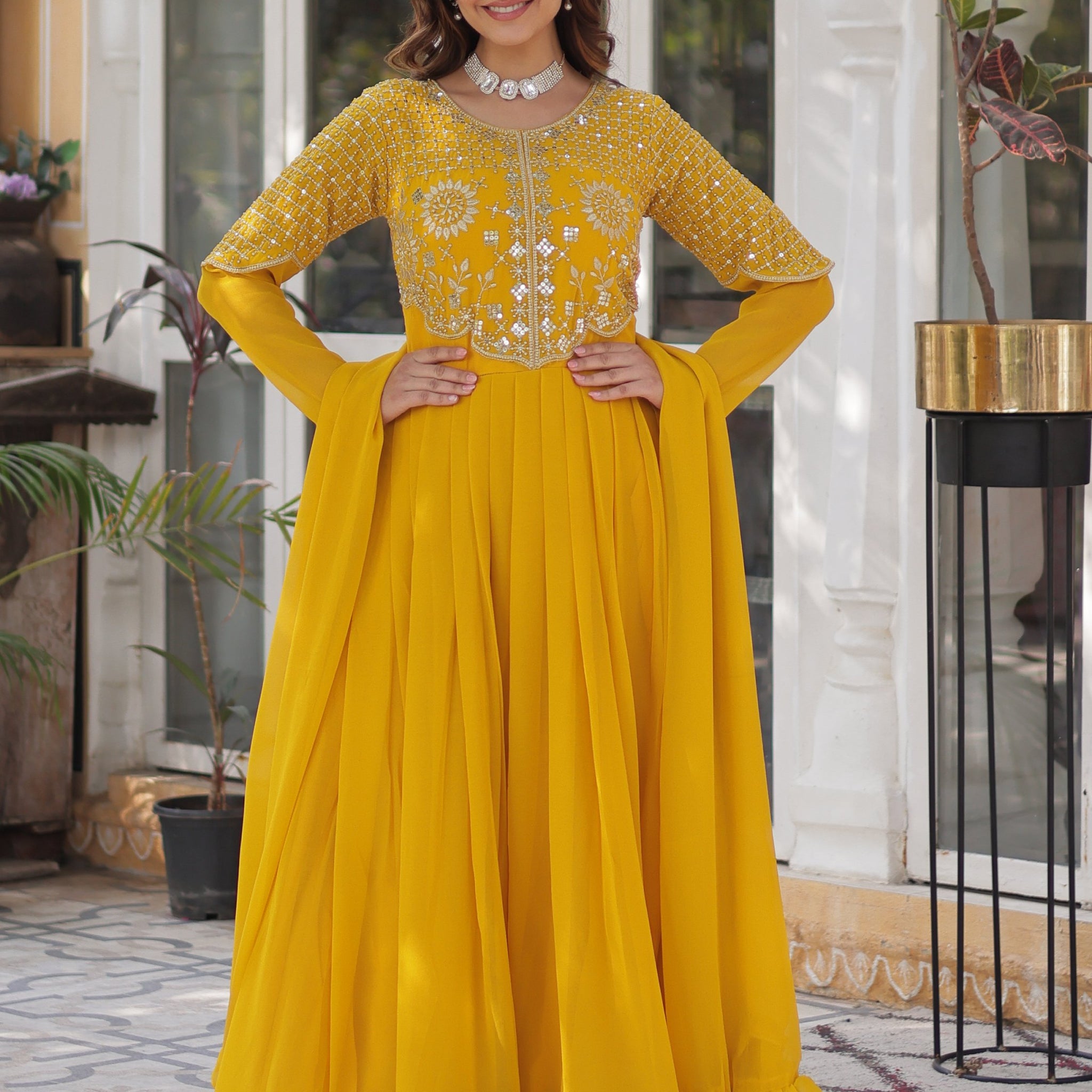 Alluring Mustard Yellow Zari Work Georgette Haldi Wear Gown With Dupatta