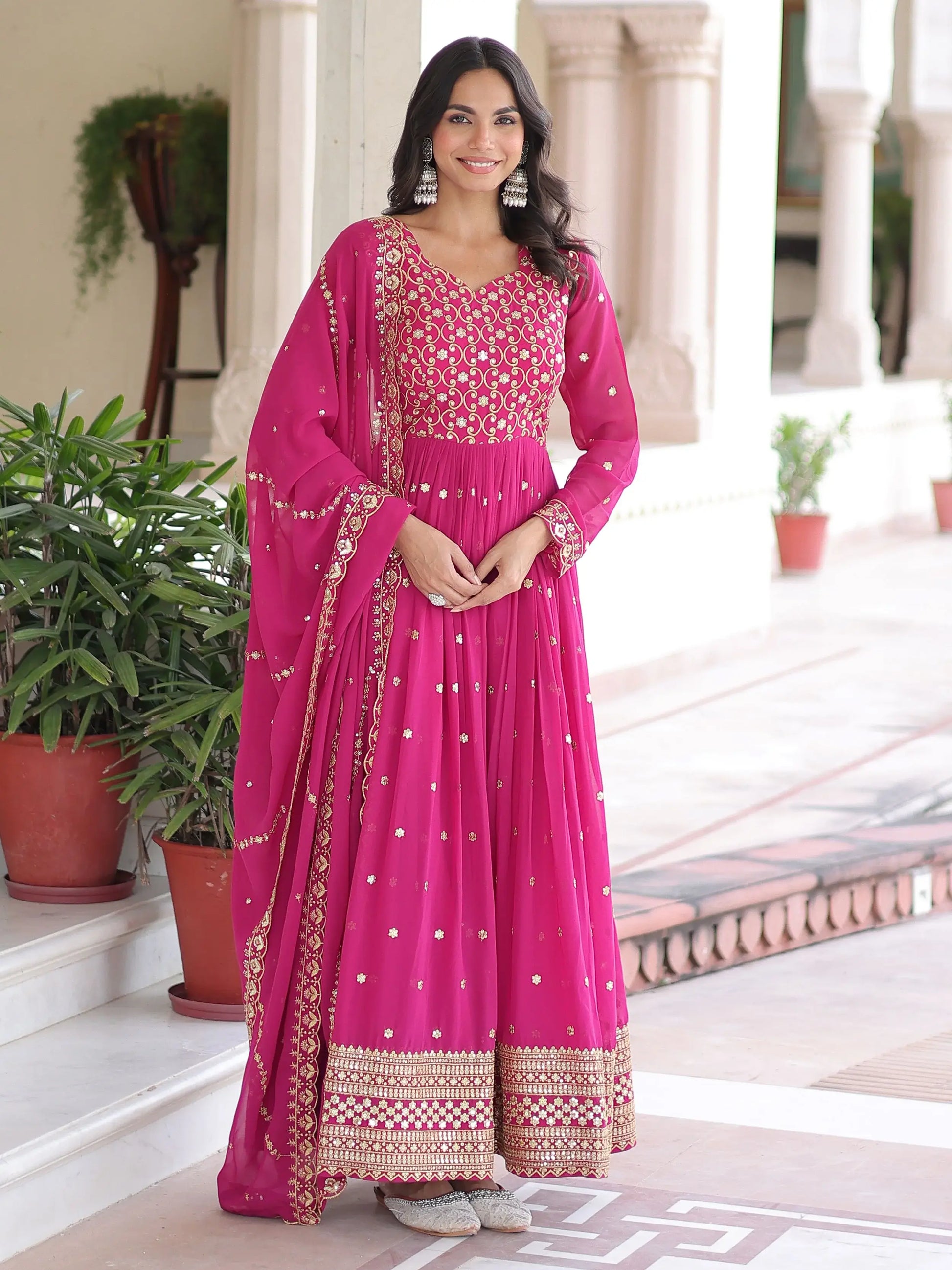Alluring Rani Pink Zari Work Georgette Designer Gown With Dupatta