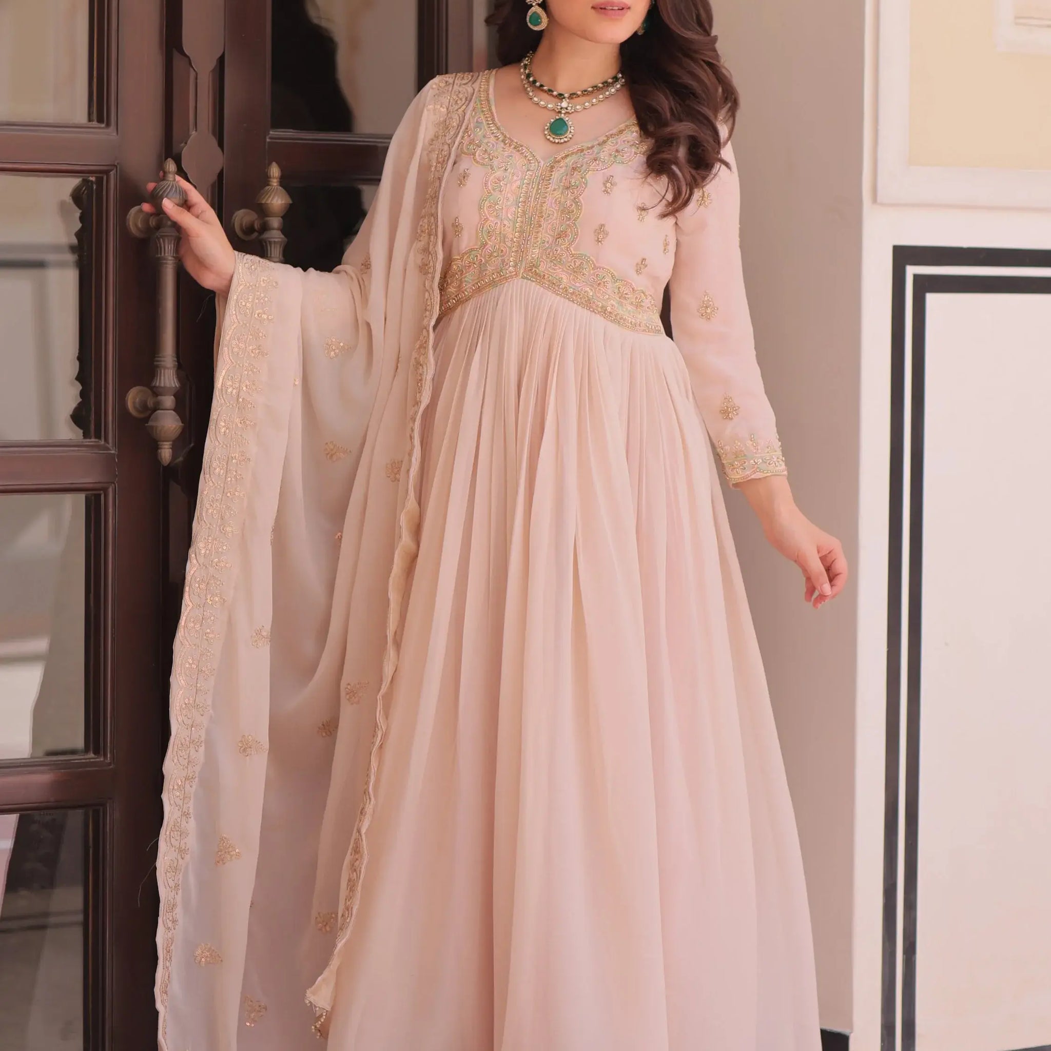 Fantabulous Cream Multi Thread Work Georgette Festive Wear Gown