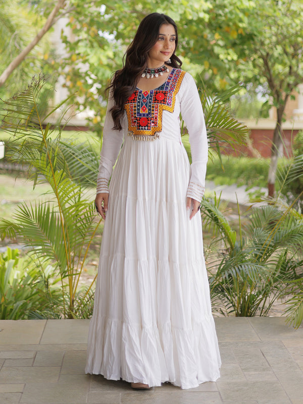 Enchanting White Mirror Work Rayon Navratri Wear Gown