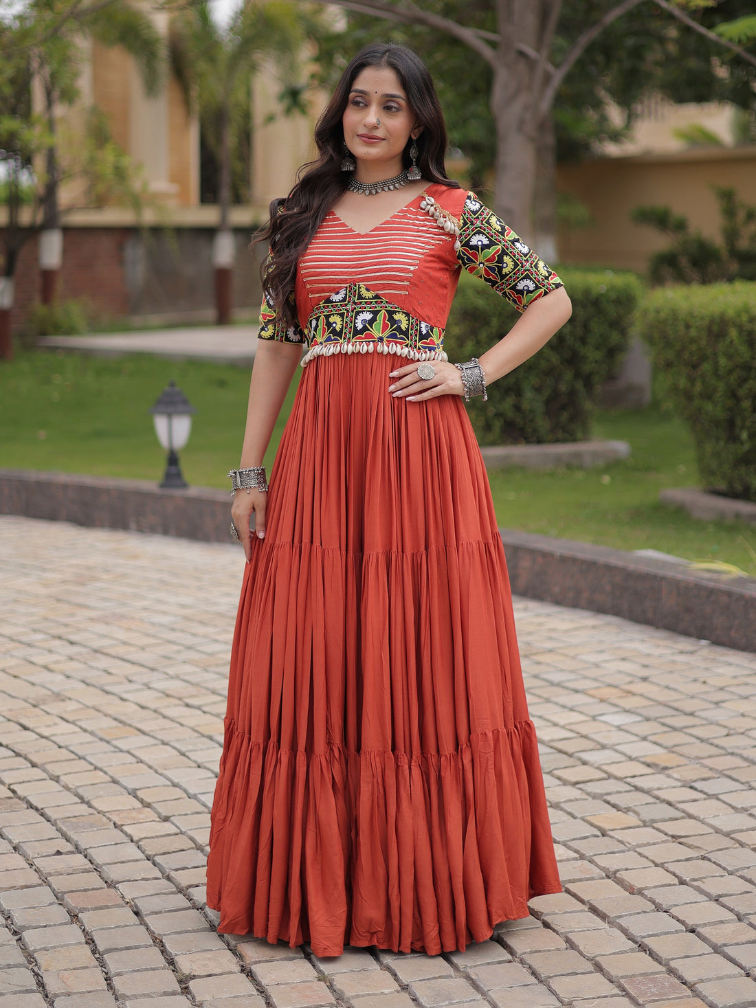 Wonderful Rust Gamthi Embroidered Rayon Navratri Wear Gown