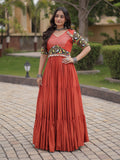 Wonderful Rust Gamthi Embroidered Rayon Navratri Wear Gown