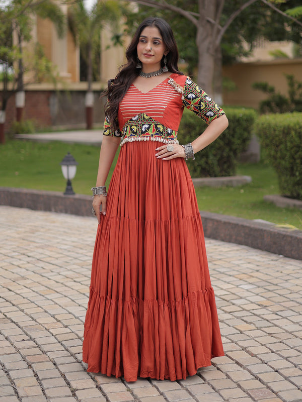 Wonderful Rust Gamthi Embroidered Rayon Navratri Wear Gown