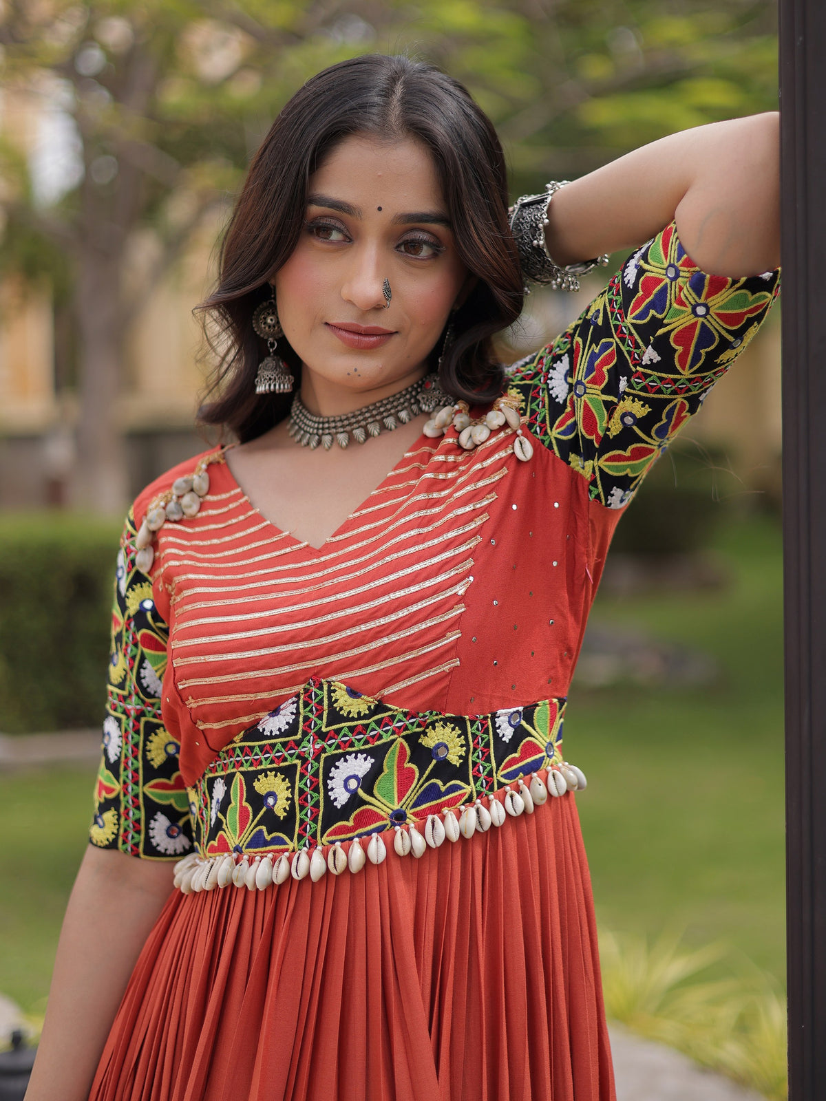 Wonderful Rust Gamthi Embroidered Rayon Navratri Wear Gown