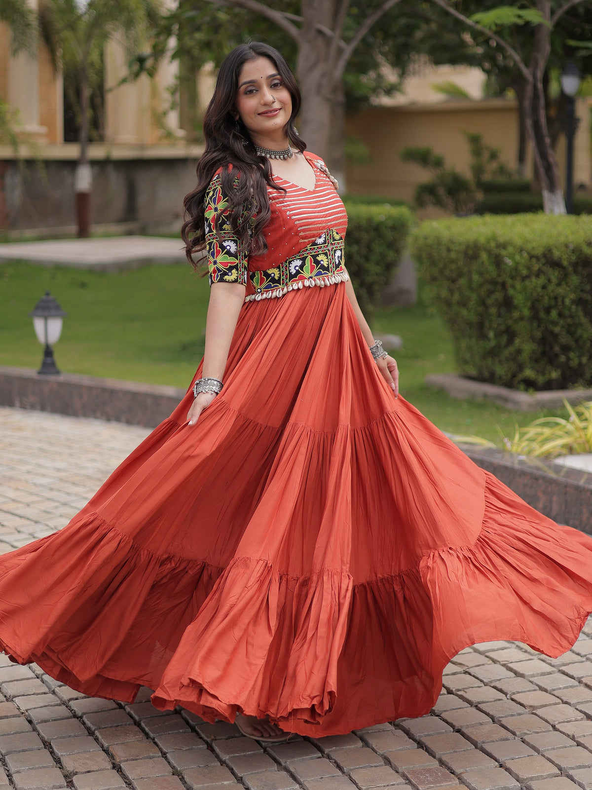 Wonderful Rust Gamthi Embroidered Rayon Navratri Wear Gown