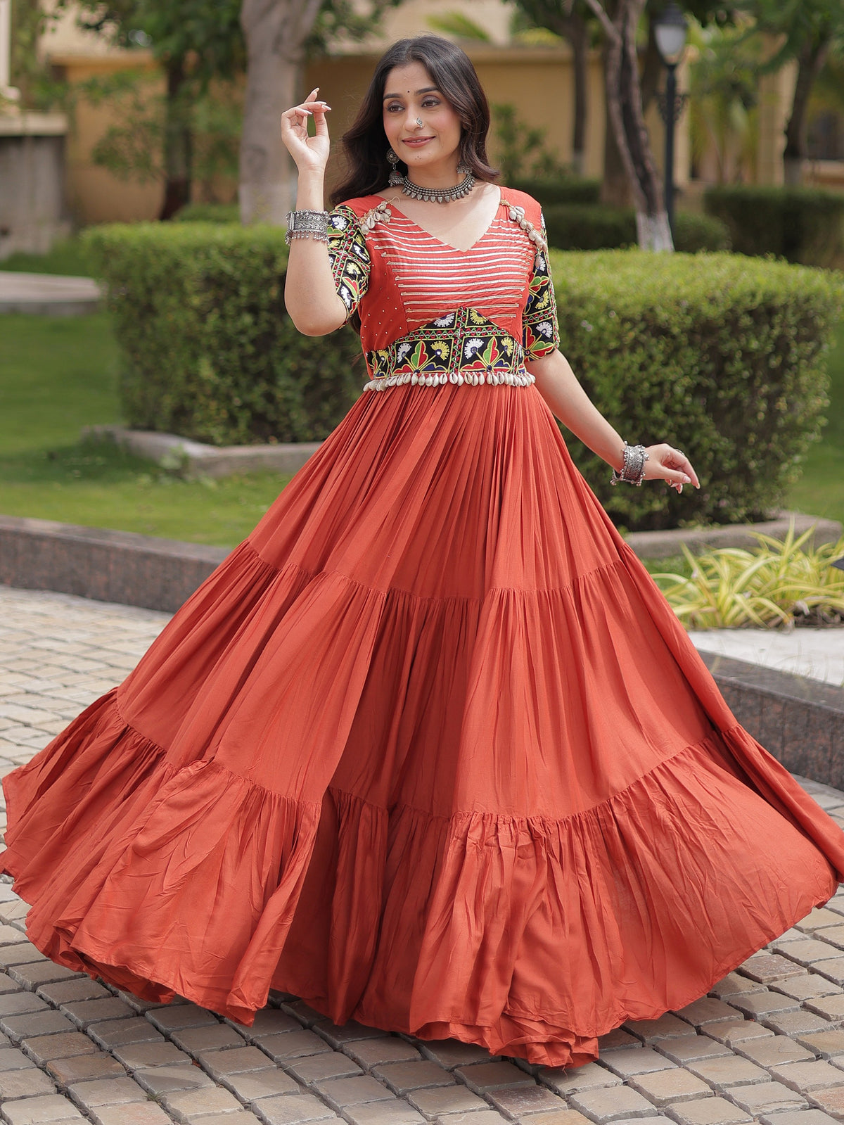 Wonderful Rust Gamthi Embroidered Rayon Navratri Wear Gown