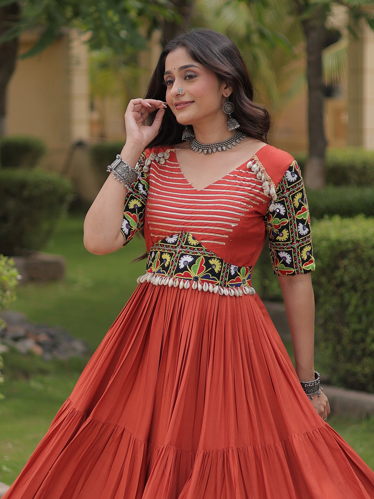 Wonderful Rust Gamthi Embroidered Rayon Navratri Wear Gown