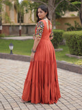 Wonderful Rust Gamthi Embroidered Rayon Navratri Wear Gown