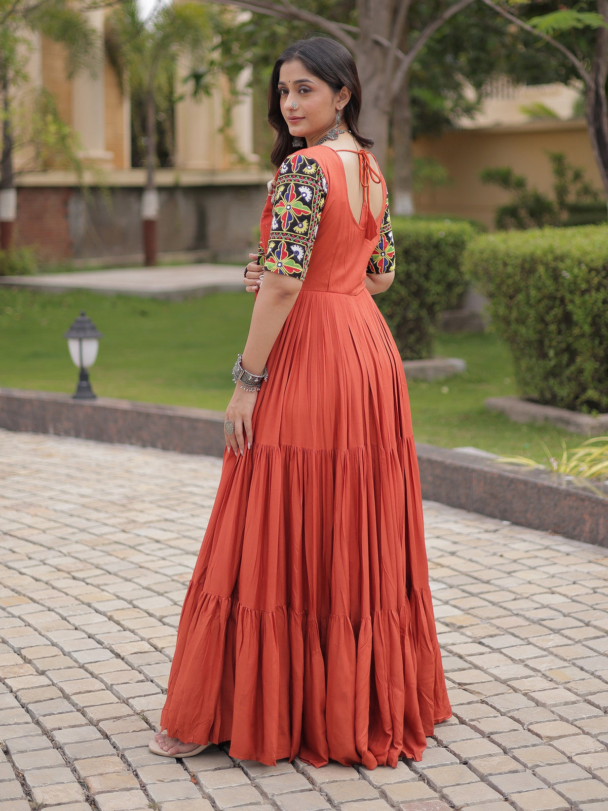 Wonderful Rust Gamthi Embroidered Rayon Navratri Wear Gown