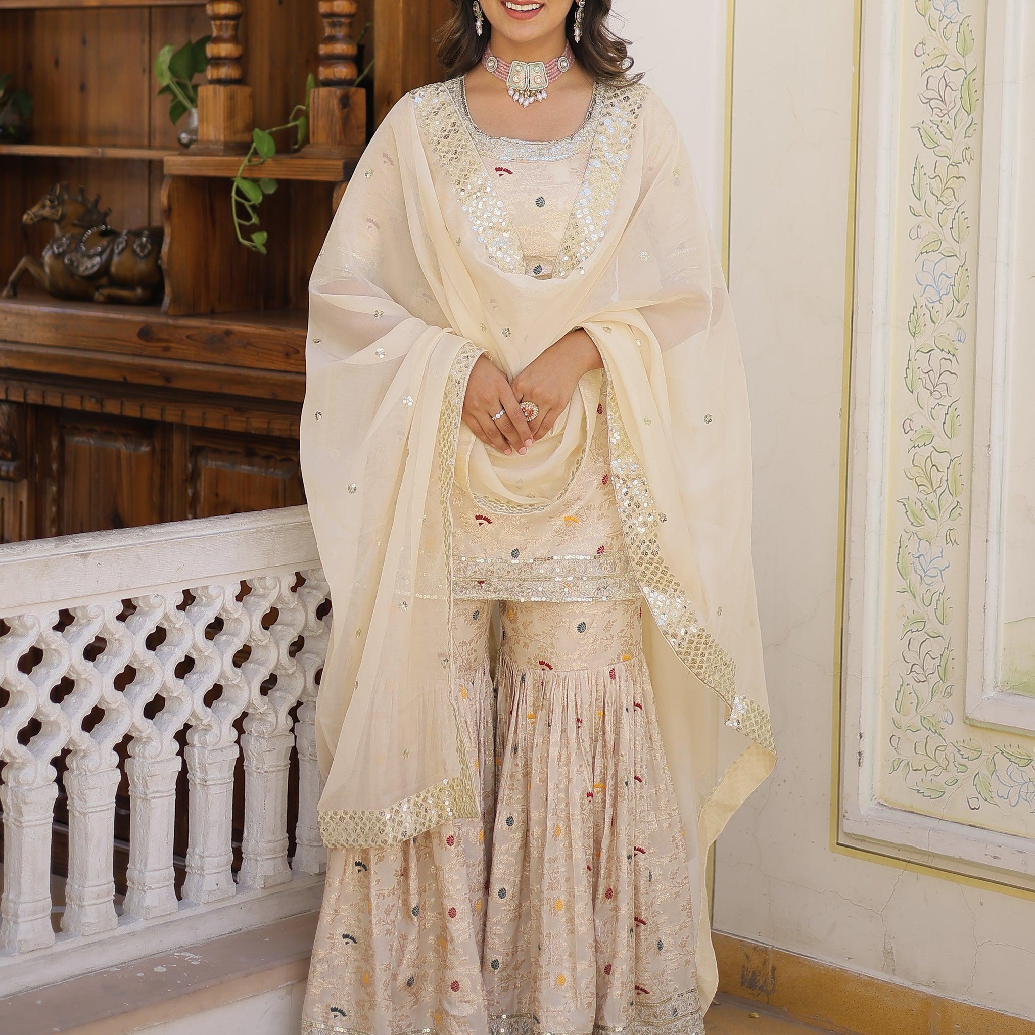 Alluring Off-White Embroidered Jacquard Designer Sharara Suit