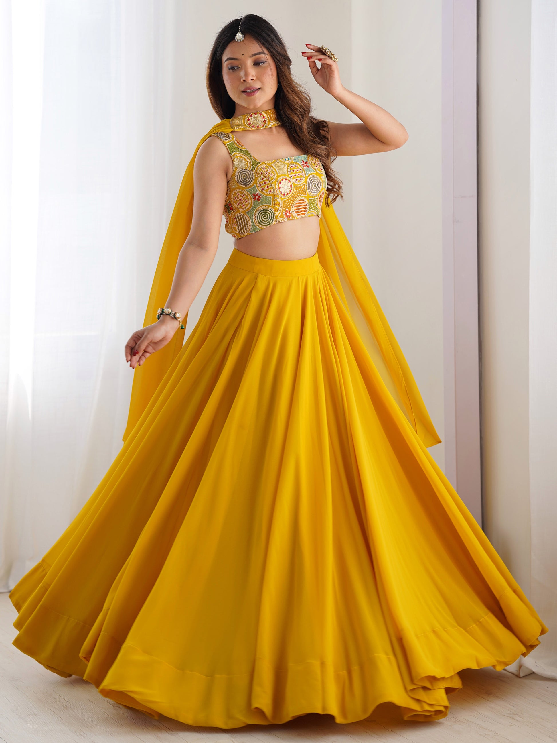 Astonishing Yellow Georgette Haldi Wear Lehenga With Embroidered Choli