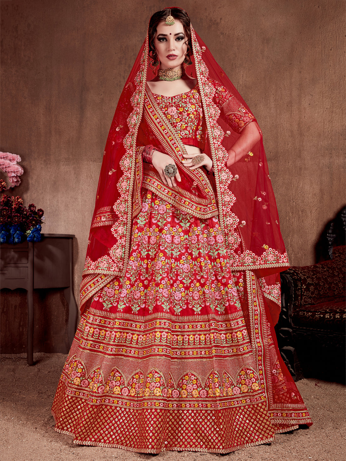 Flattering Red Colored Designer Bridal wear Embroidered Lehenga Choli