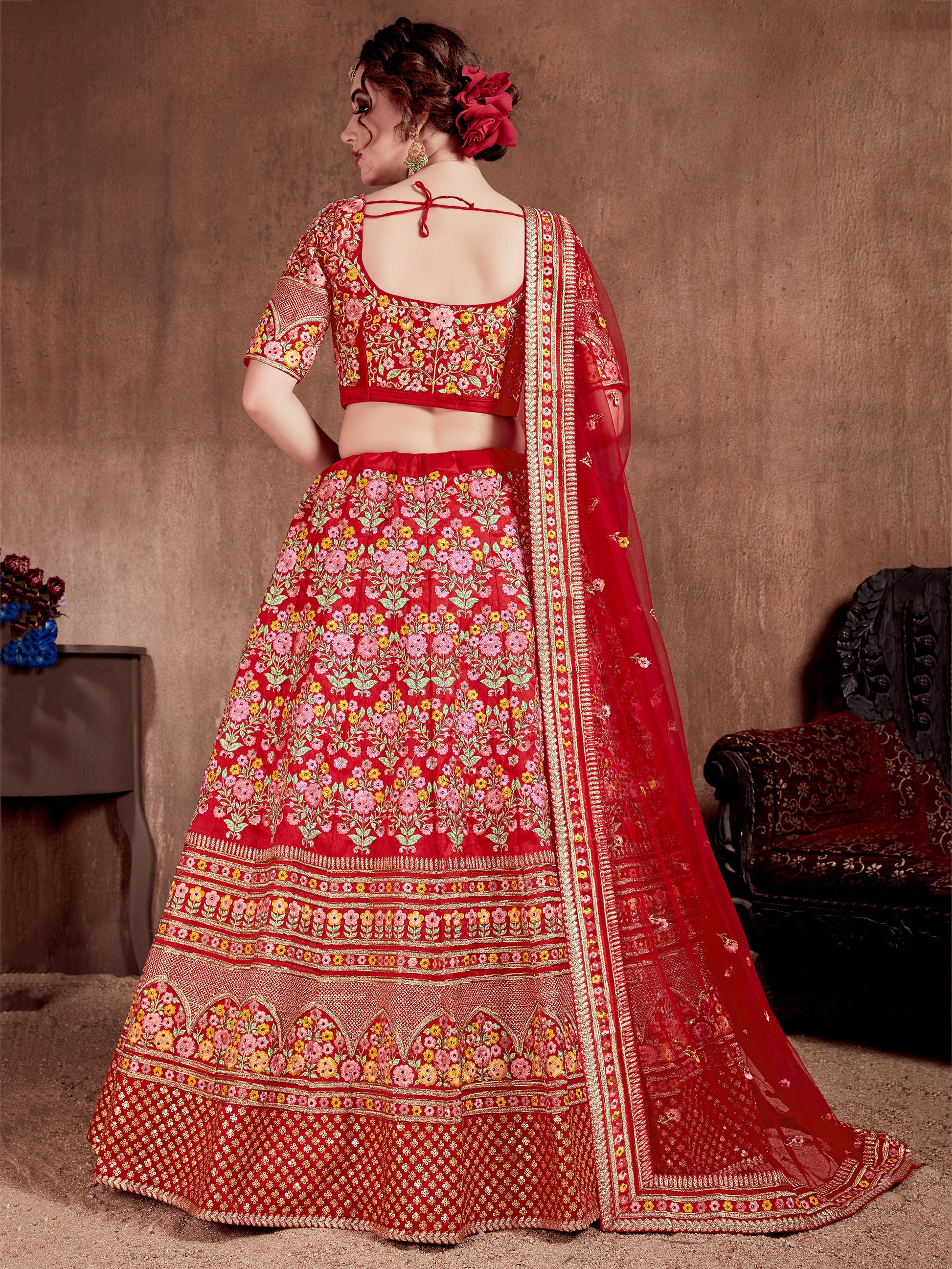 Flattering Red Colored Designer Bridal wear Embroidered Lehenga Choli
