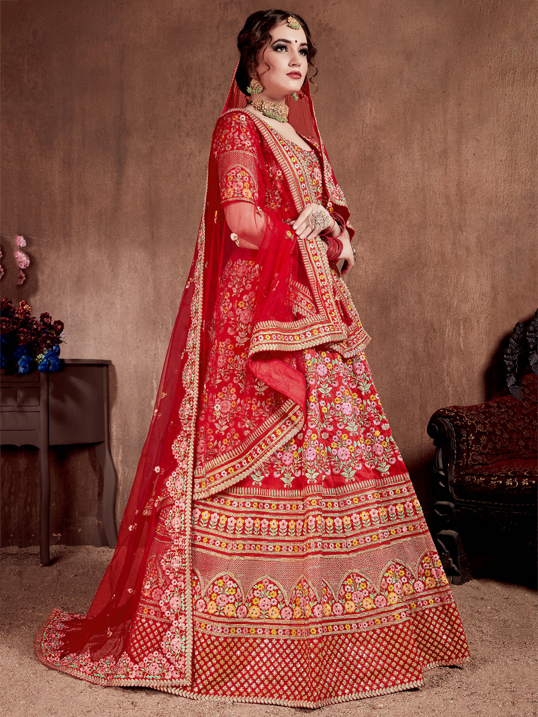 Flattering Red Colored Designer Bridal wear Embroidered Lehenga Choli