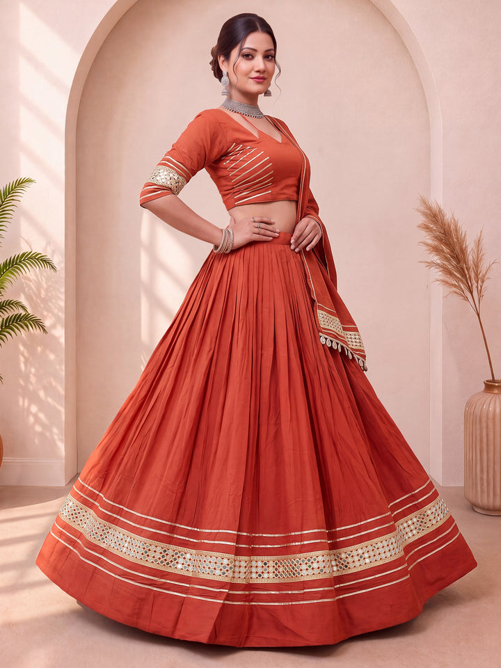 Great Rust Gota Patti Cotton Navratri Wear Lehenga Choli With Dupatta