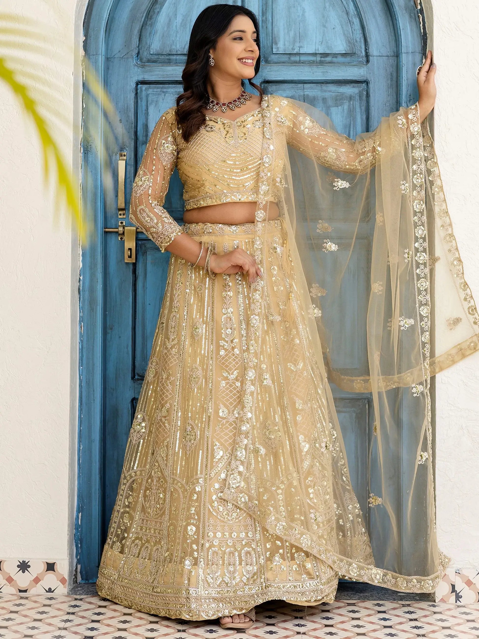 Incredible Cream Sequins Net Party Wear Lehenga Choli With Dupatta