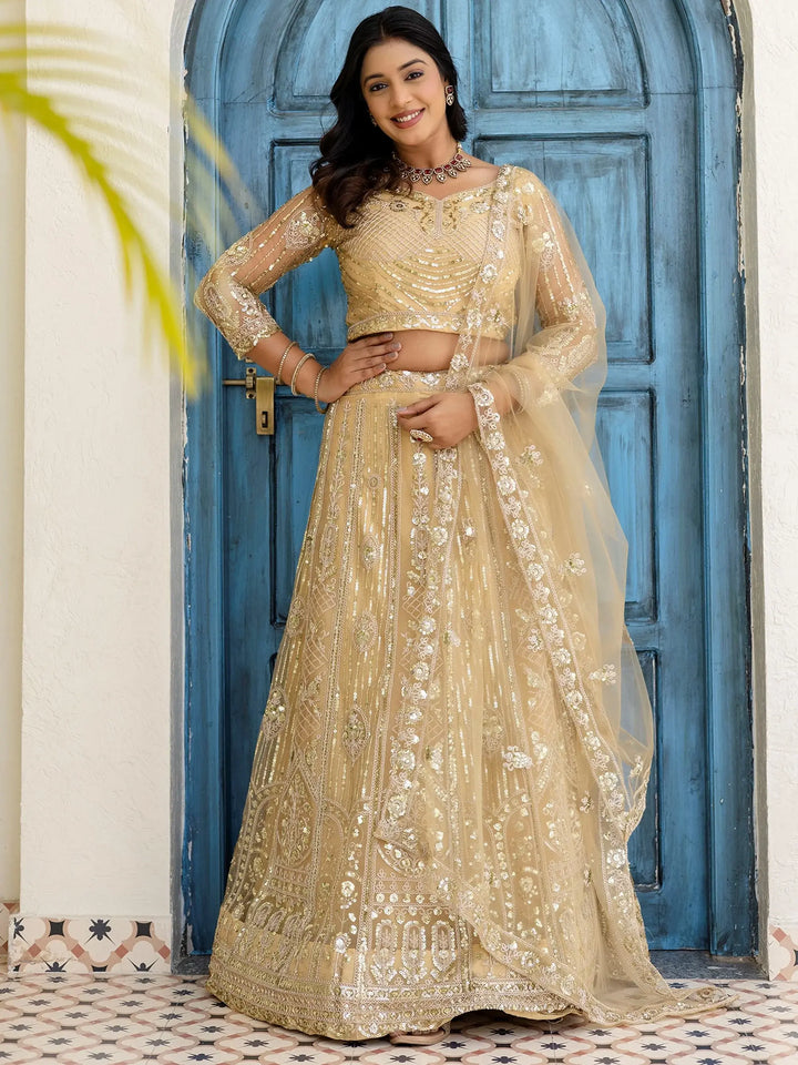 Incredible Cream Sequins Net Party Wear Lehenga Choli With Dupatta