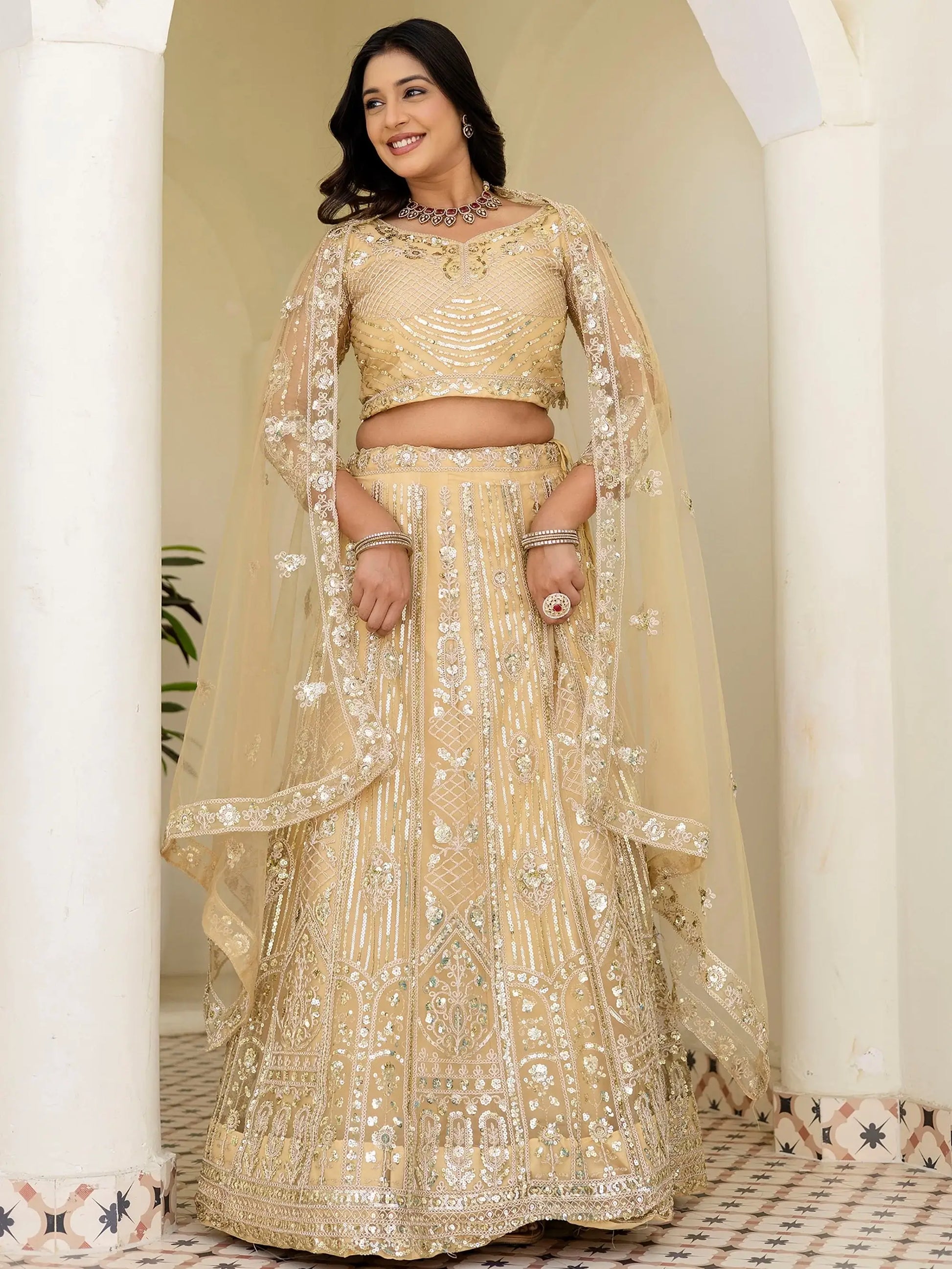 Incredible Cream Sequins Net Party Wear Lehenga Choli With Dupatta