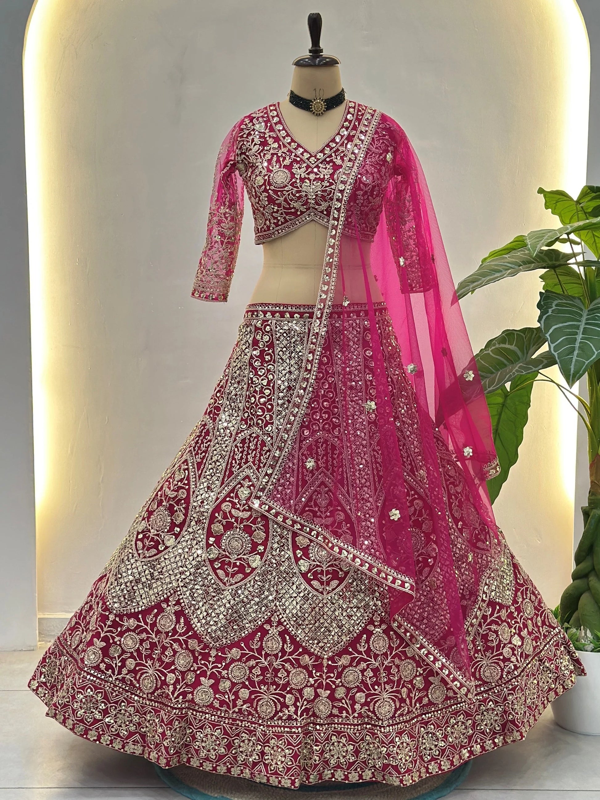 Attractive Rani Pink Embroidery Net Bridesmaid Wear Lehenga Choli With Dupatta