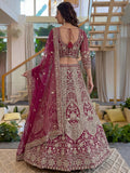 Attractive Rani Pink Embroidery Net Bridesmaid Wear Lehenga Choli With Dupatta
