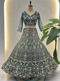 Awesome Teal Blue Sequins Net Engagement Wear Lehenga Choli