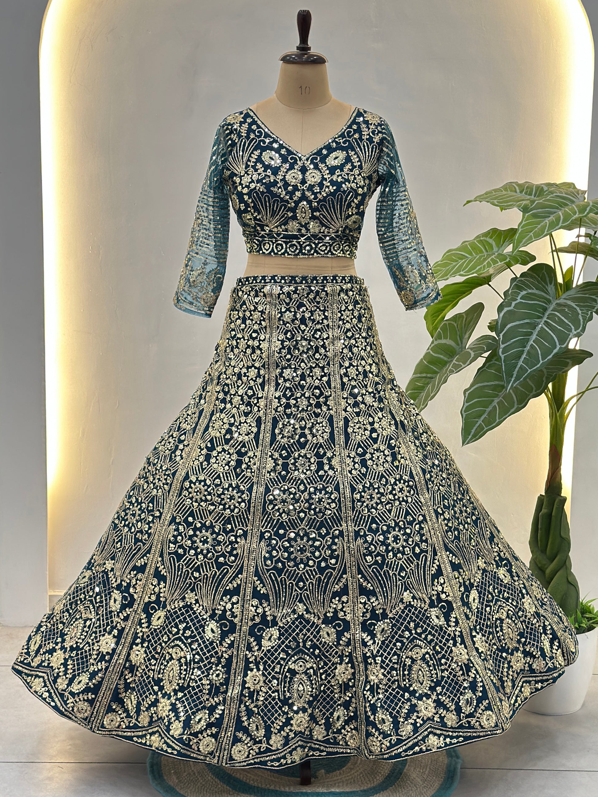Awesome Teal Blue Sequins Net Engagement Wear Lehenga Choli