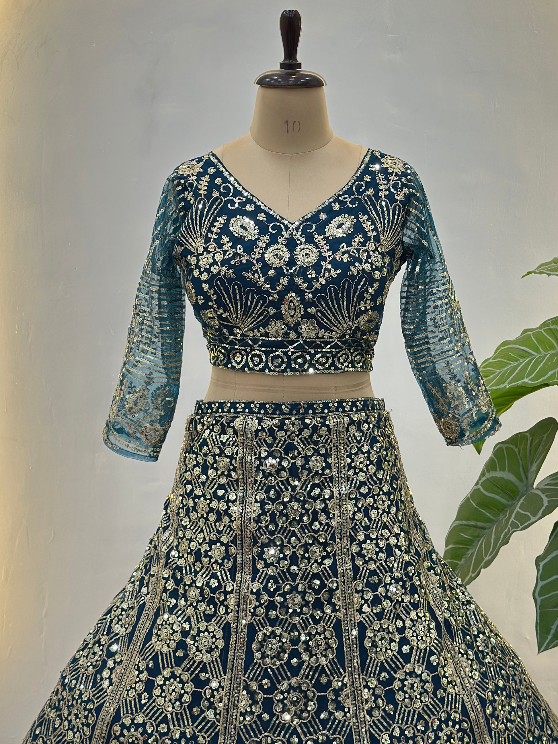 Awesome Teal Blue Sequins Net Engagement Wear Lehenga Choli