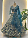 Awesome Teal Blue Sequins Net Engagement Wear Lehenga Choli
