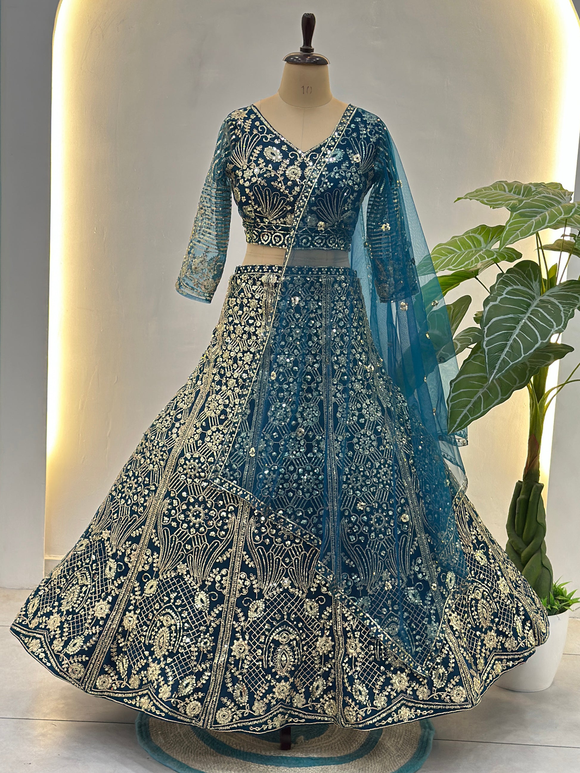Awesome Teal Blue Sequins Net Engagement Wear Lehenga Choli