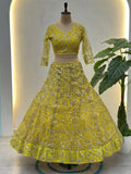 Beautiful Yellow Sequins Net Reception Wear Lehenga Choli With Dupatta