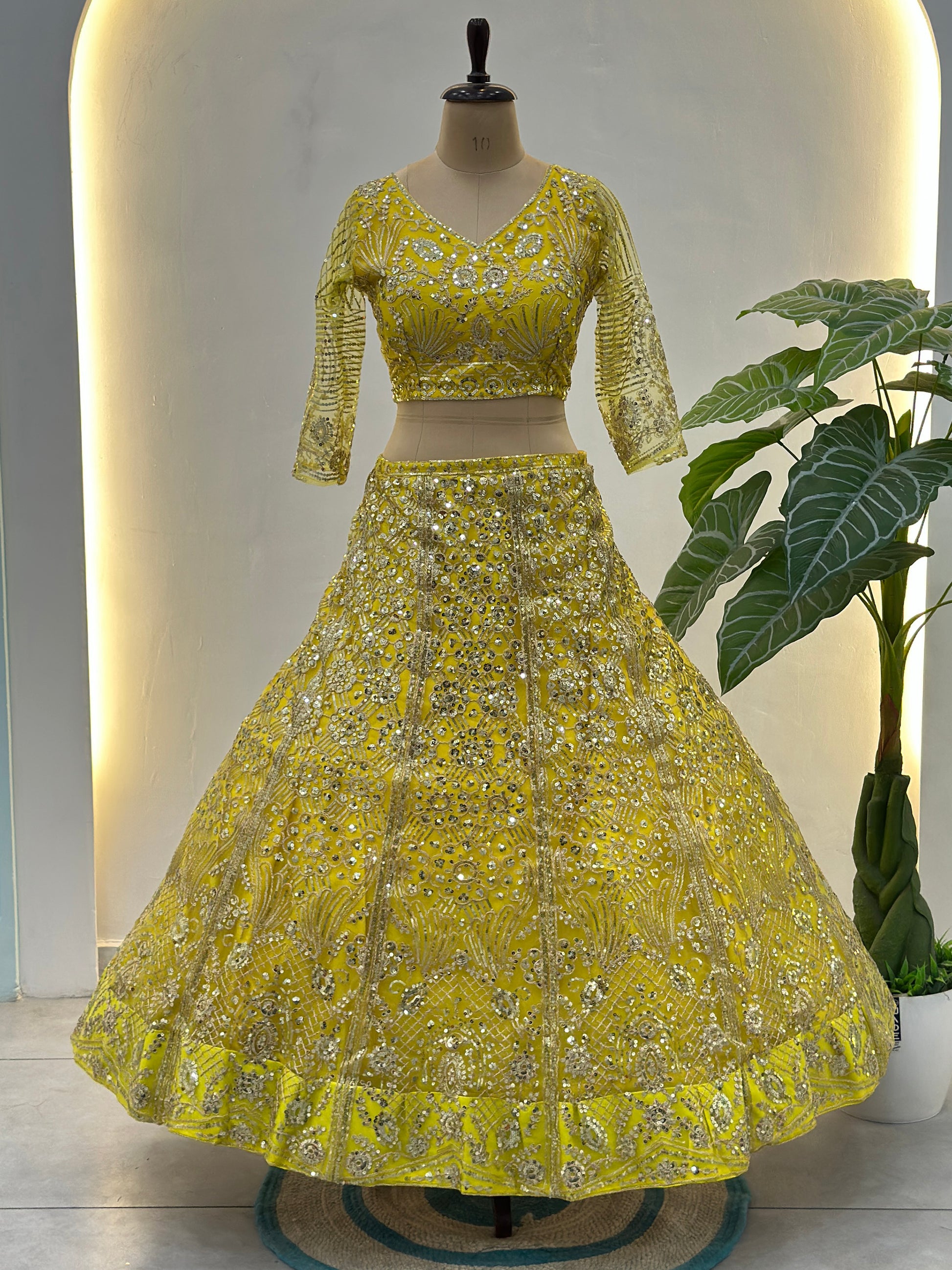 Beautiful Yellow Sequins Net Reception Wear Lehenga Choli With Dupatta