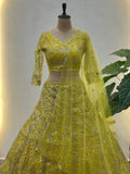 Beautiful Yellow Sequins Net Reception Wear Lehenga Choli With Dupatta