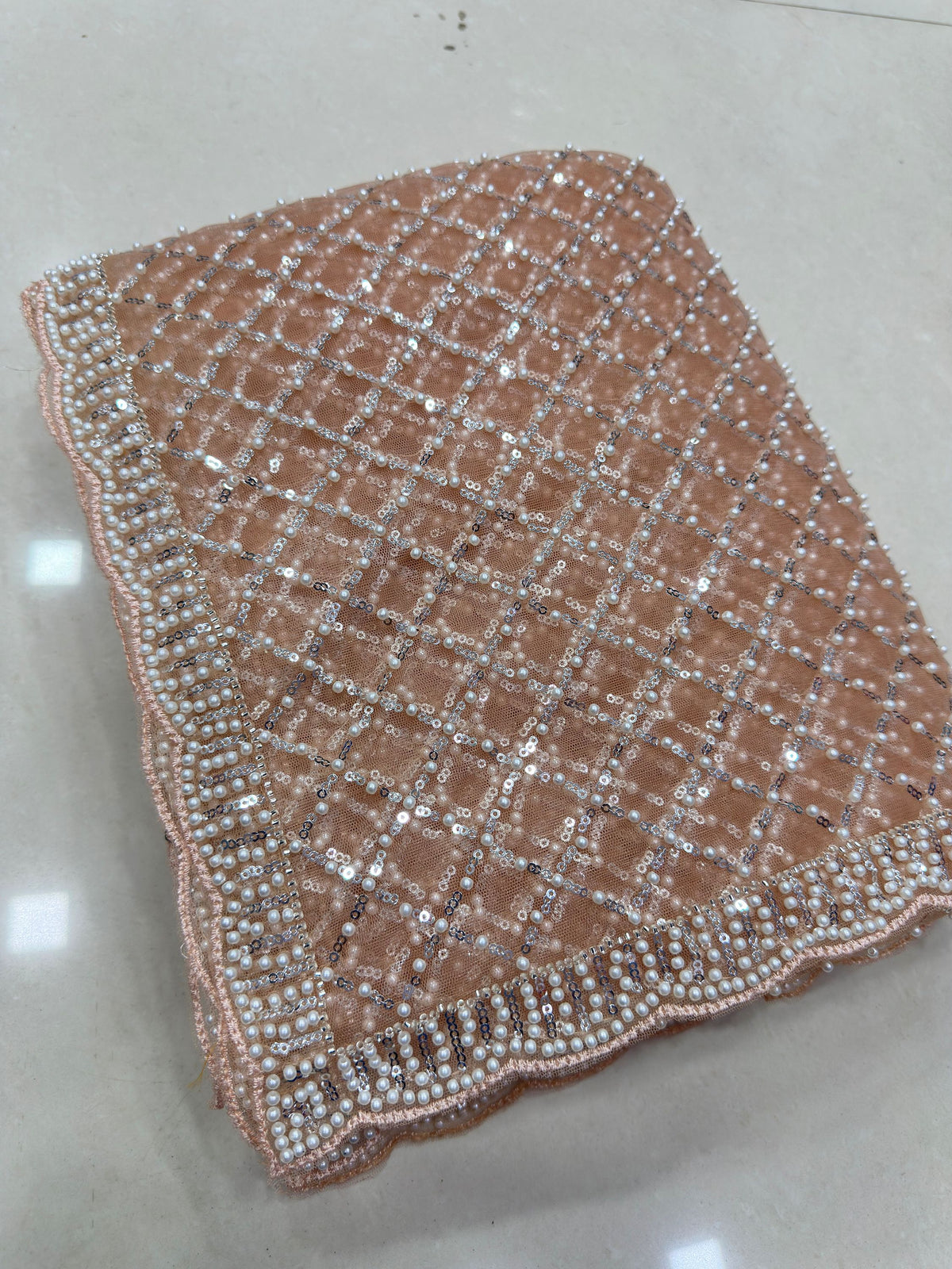 Graceful Peach Beads Work Net Reception Wear Saree