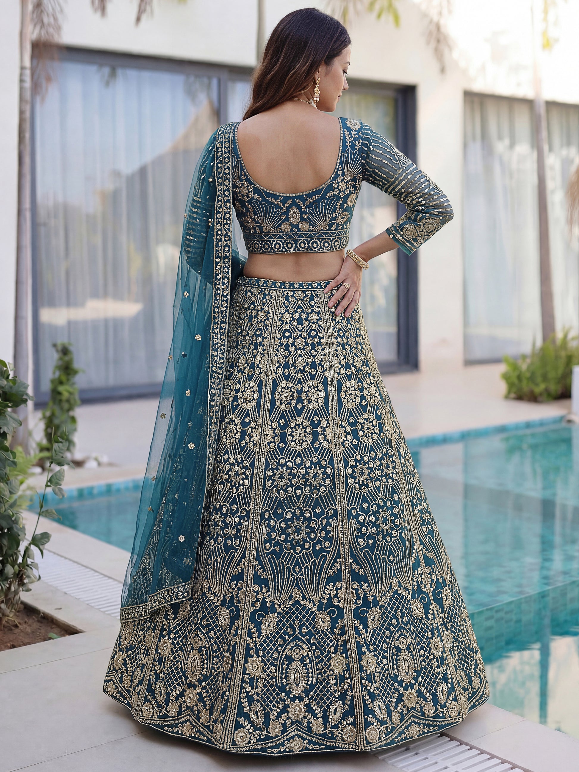 Awesome Teal Blue Sequins Net Engagement Wear Lehenga Choli