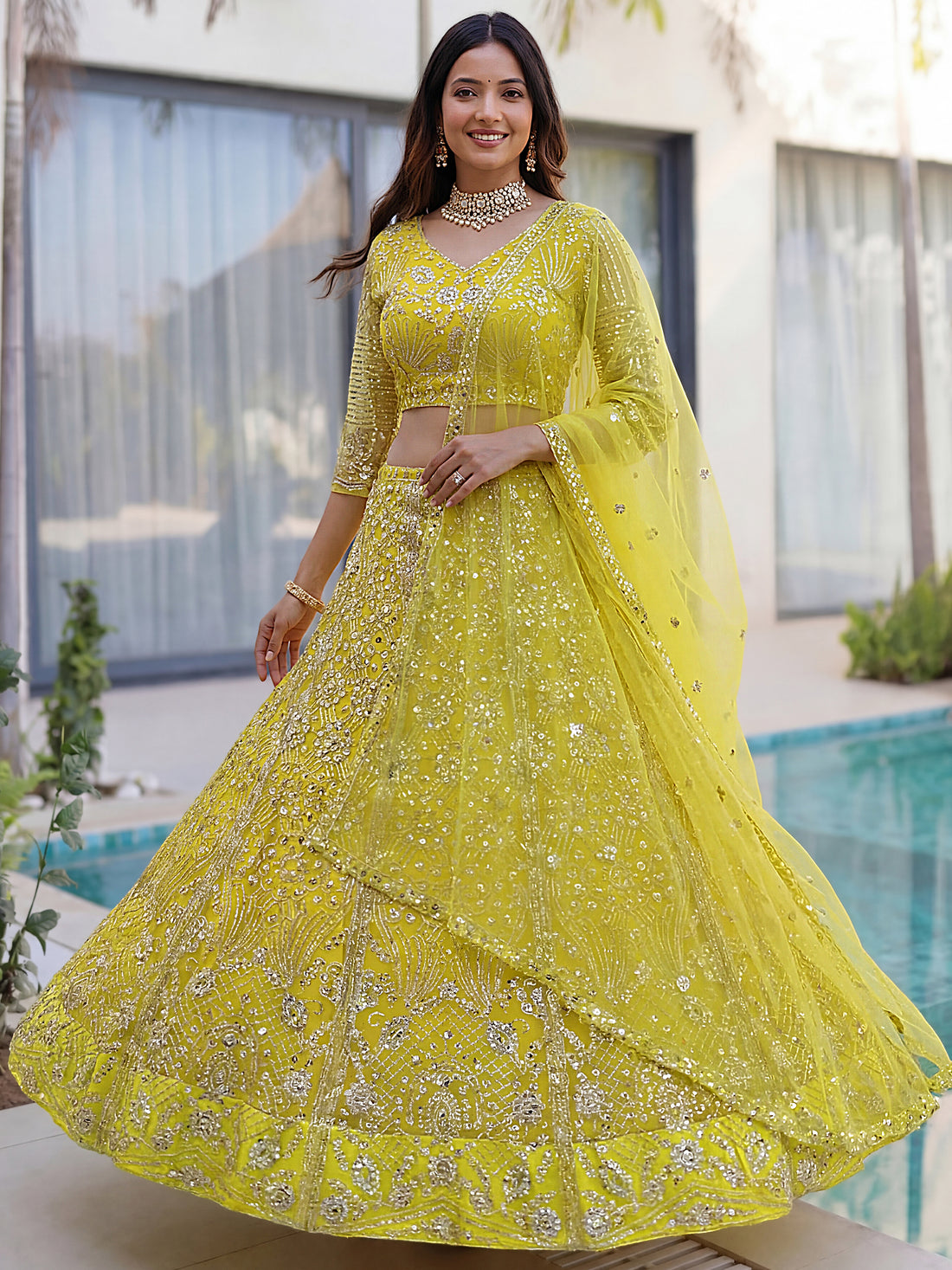 Beautiful Yellow Sequins Net Reception Wear Lehenga Choli With Dupatta