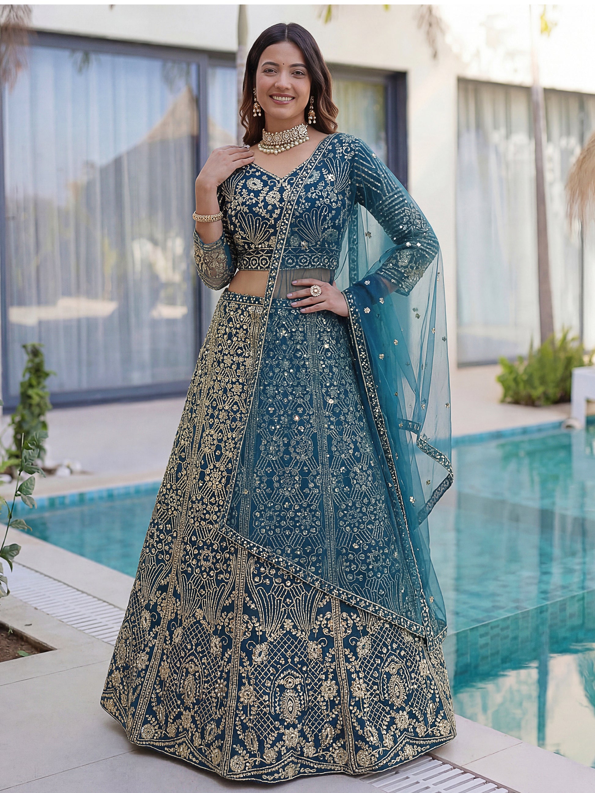 Awesome Teal Blue Sequins Net Engagement Wear Lehenga Choli