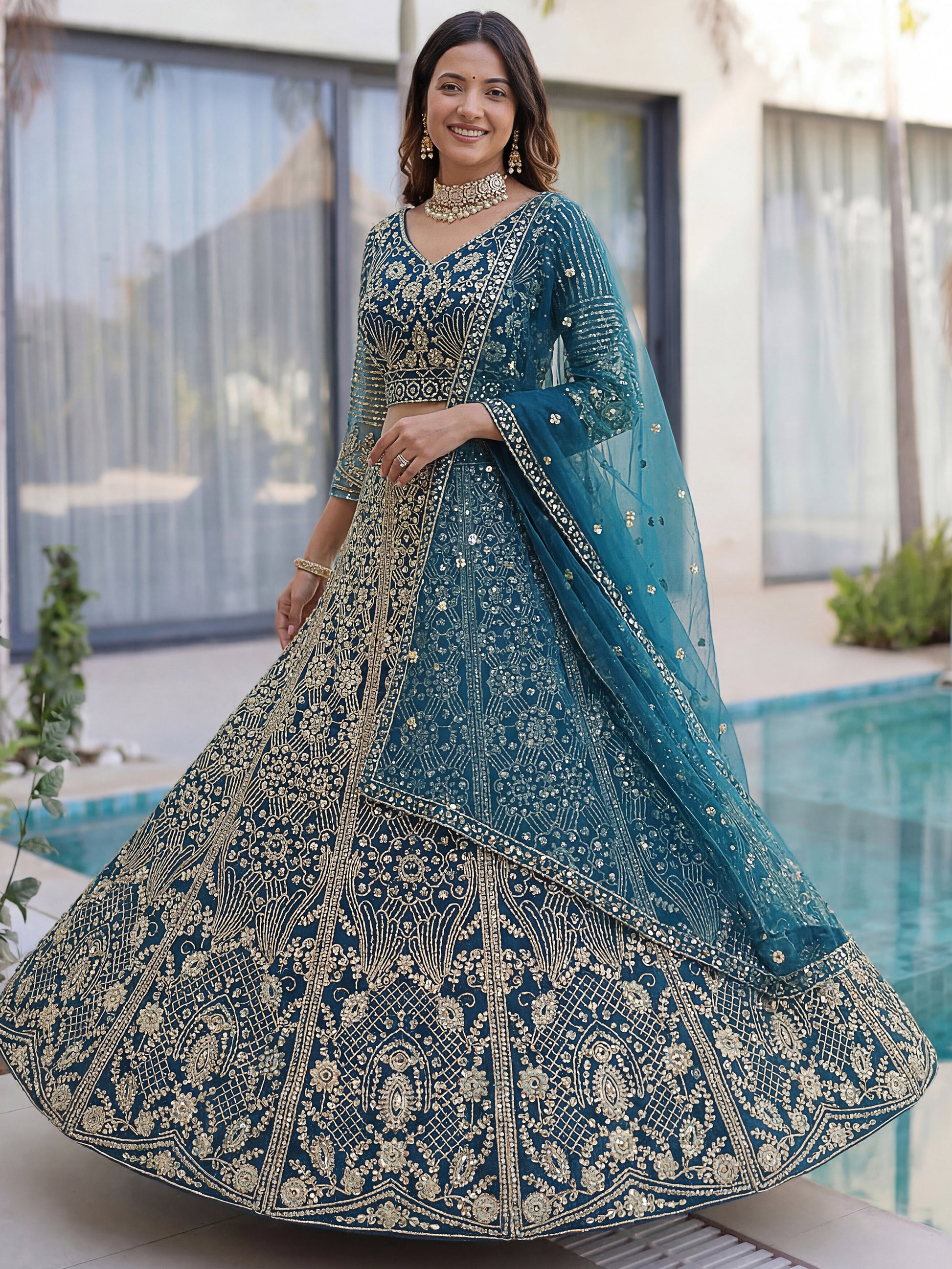 Awesome Teal Blue Sequins Net Engagement Wear Lehenga Choli
