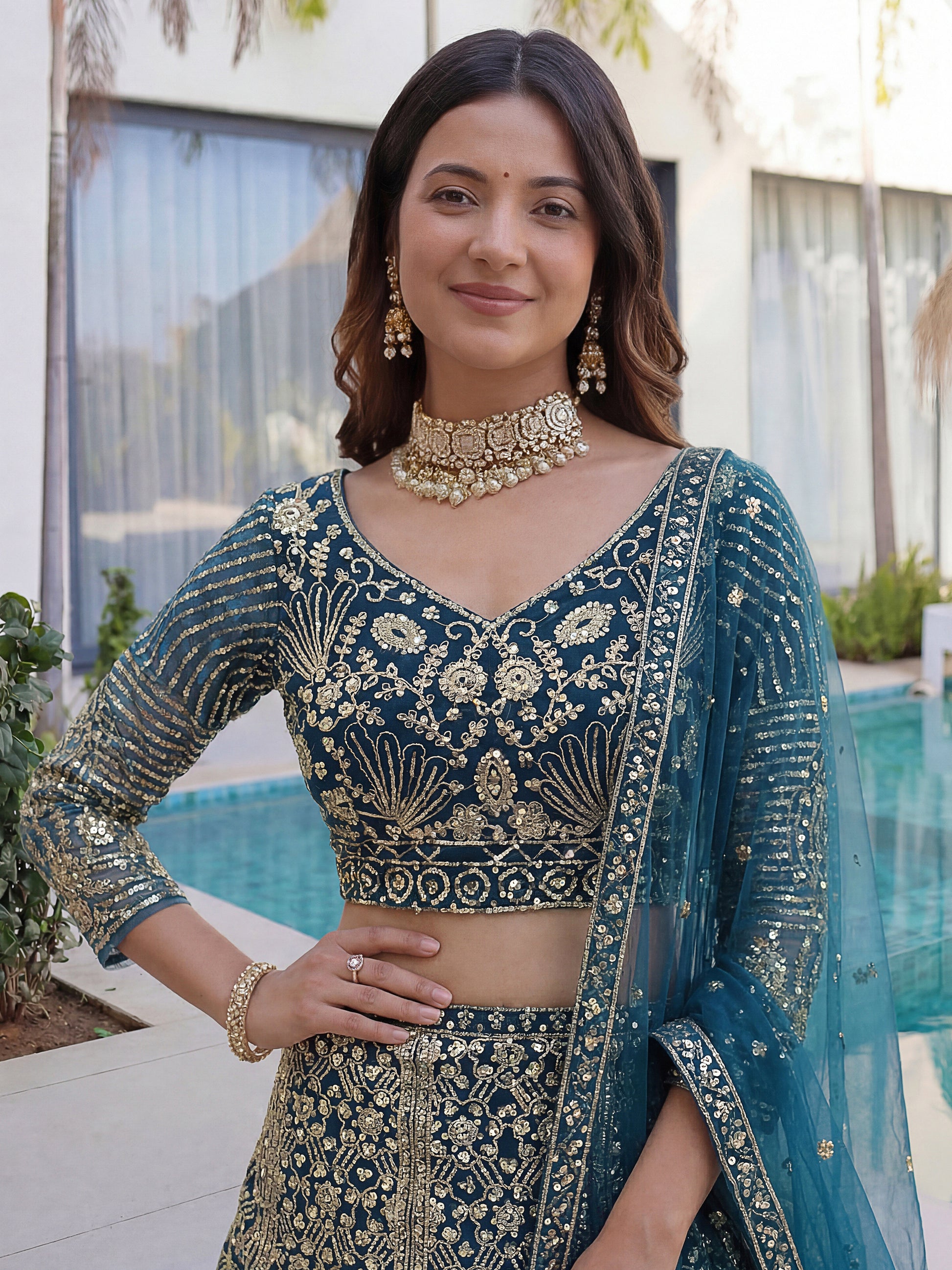 Awesome Teal Blue Sequins Net Engagement Wear Lehenga Choli
