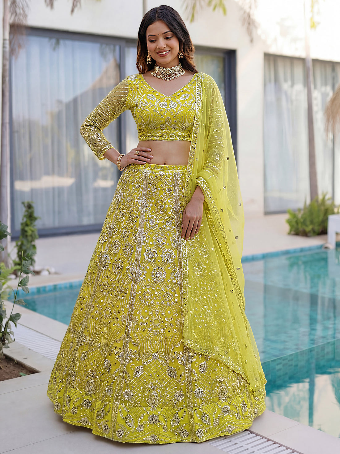 Beautiful Yellow Sequins Net Reception Wear Lehenga Choli With Dupatta