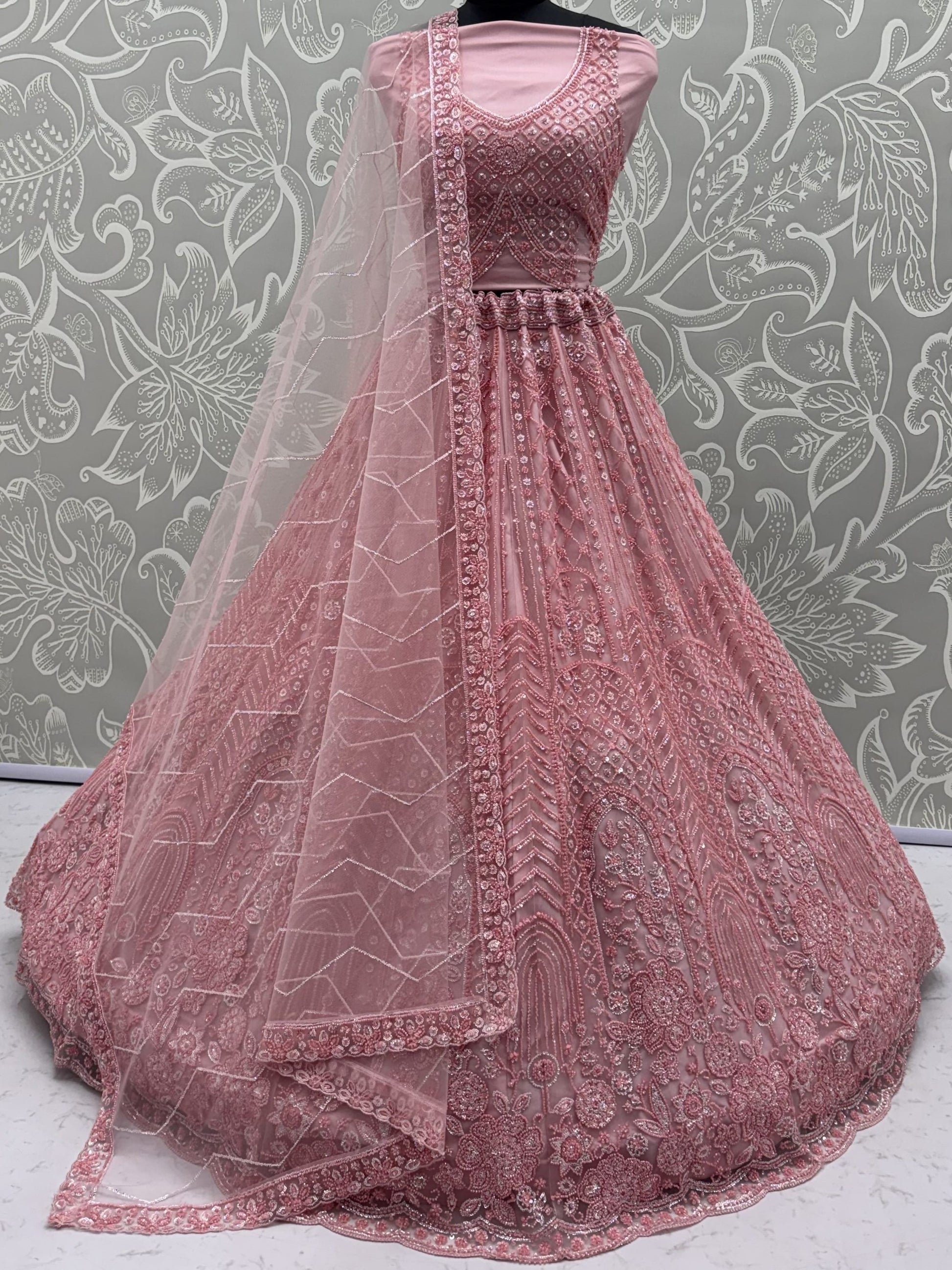 Dazzling Dusty Pink Sequins Net Wedding Wear Lehenga Choli With Dupatta