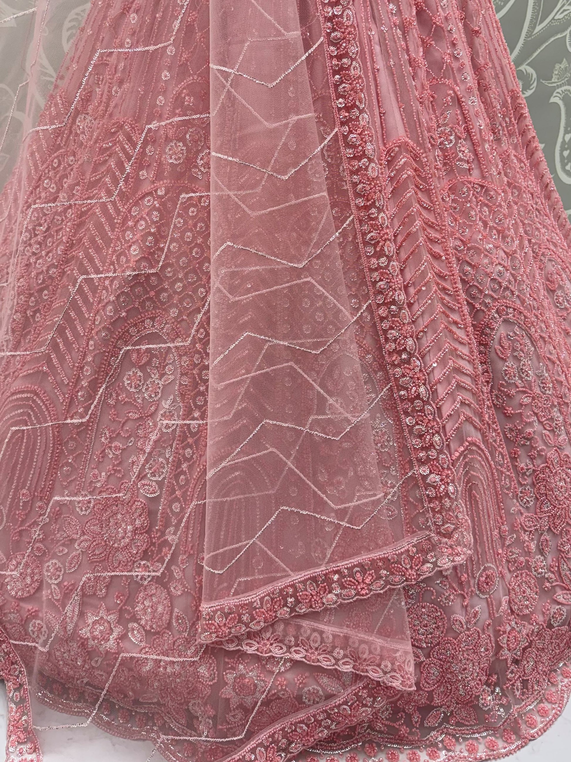 Dazzling Dusty Pink Sequins Net Wedding Wear Lehenga Choli With Dupatta