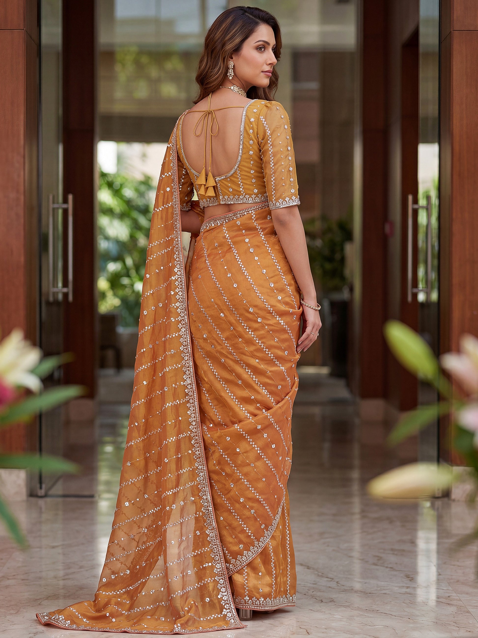 Dazzling Peach Embroidery Satin Festival Wear Saree With Blouse