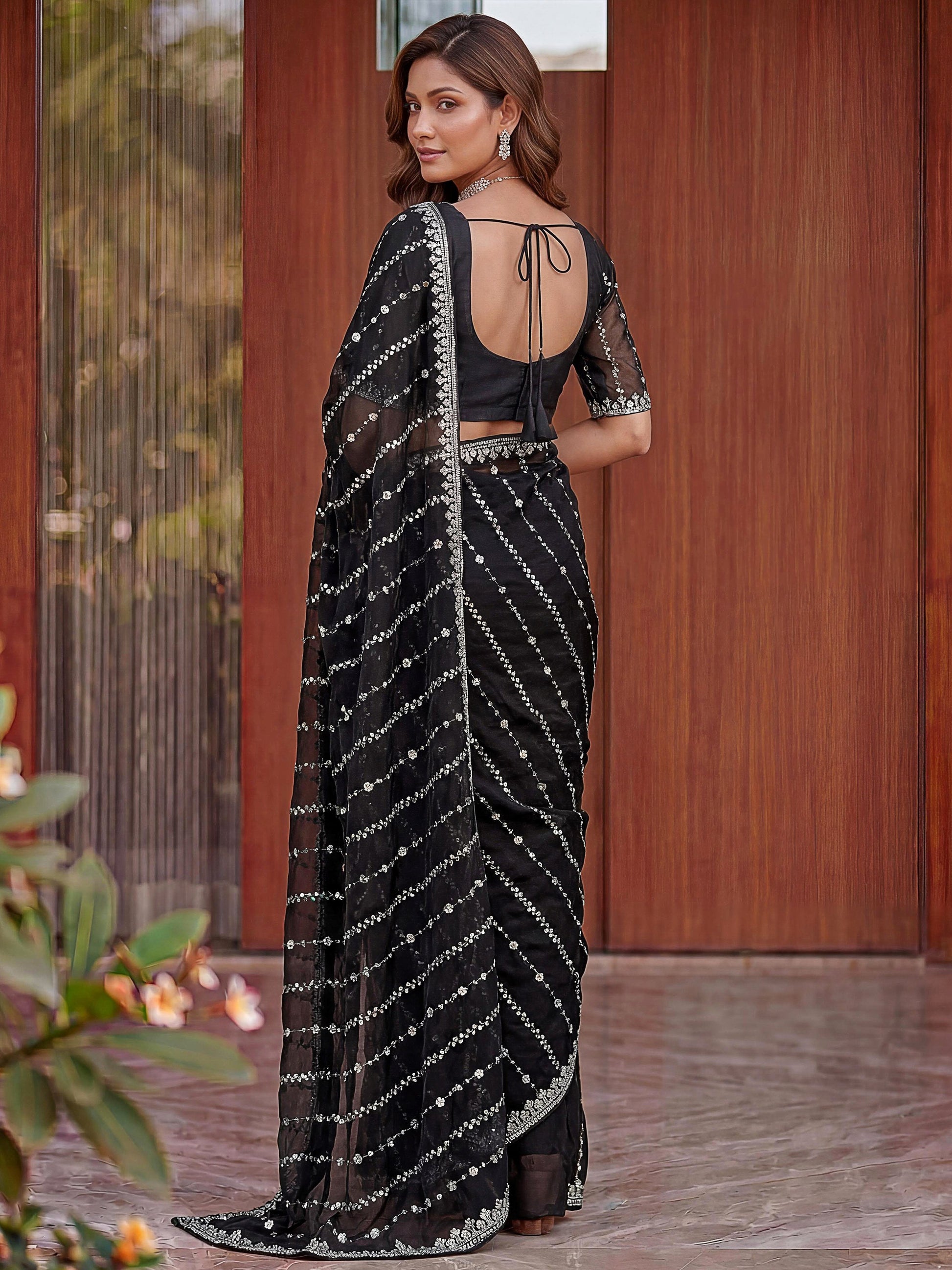 Alluring Black Embroidery Satin Festival Wear Saree With Blouse