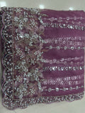 Enchanting Mauve Beads Work Net Wedding Wear Saree With Blouse